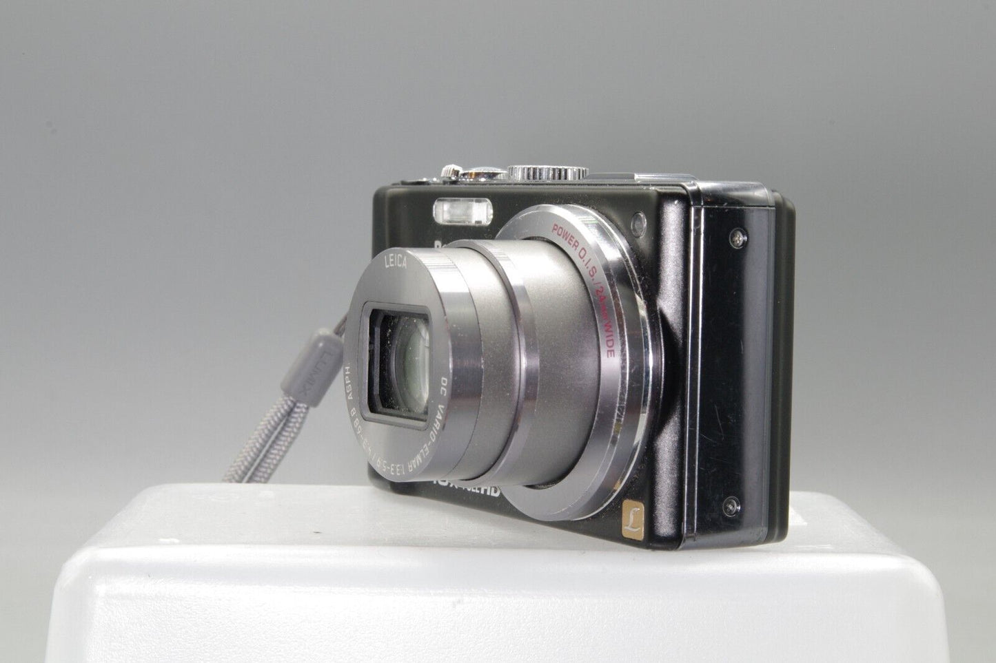 Panasonic Lumix DMC-ZS10 14.1MP Digital Camera - Working but needs battery cover