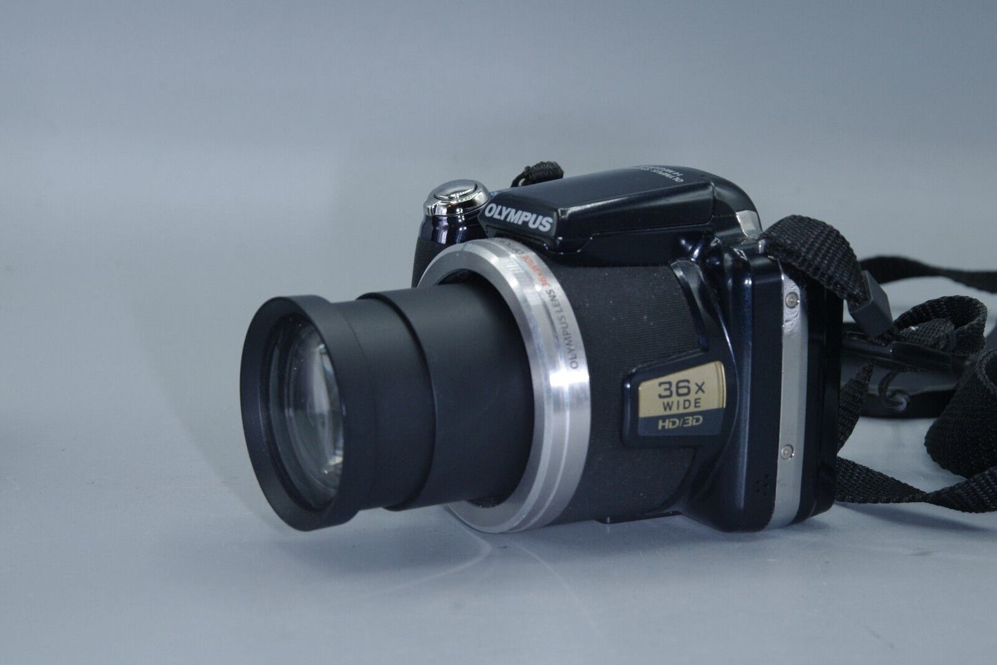 Olympus SP-810UZ 14MP 36X Zoom Digital Bridge Camera and Charger