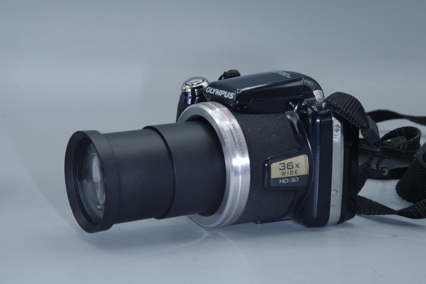 Olympus SP-810UZ 14MP 36X Zoom Digital Bridge Camera and Charger