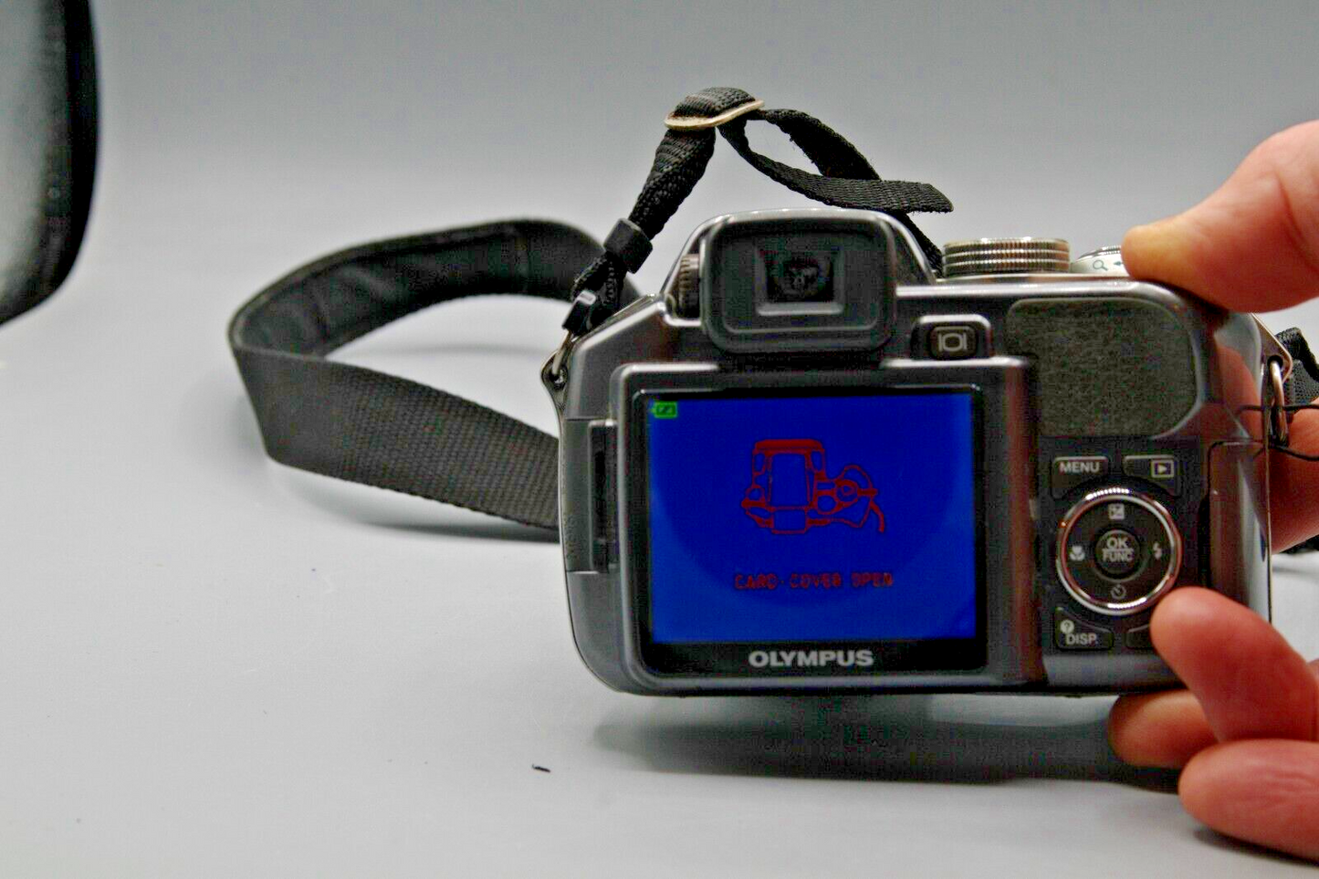 Olympus Stylus SP-550UZ 7MP 18X Digital Bridge Camera - Repair Required