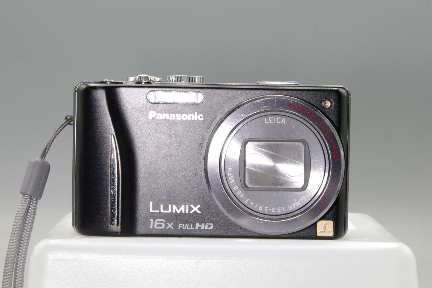 Panasonic Lumix DMC-ZS10 14.1MP Digital Camera - Working but needs battery cover
