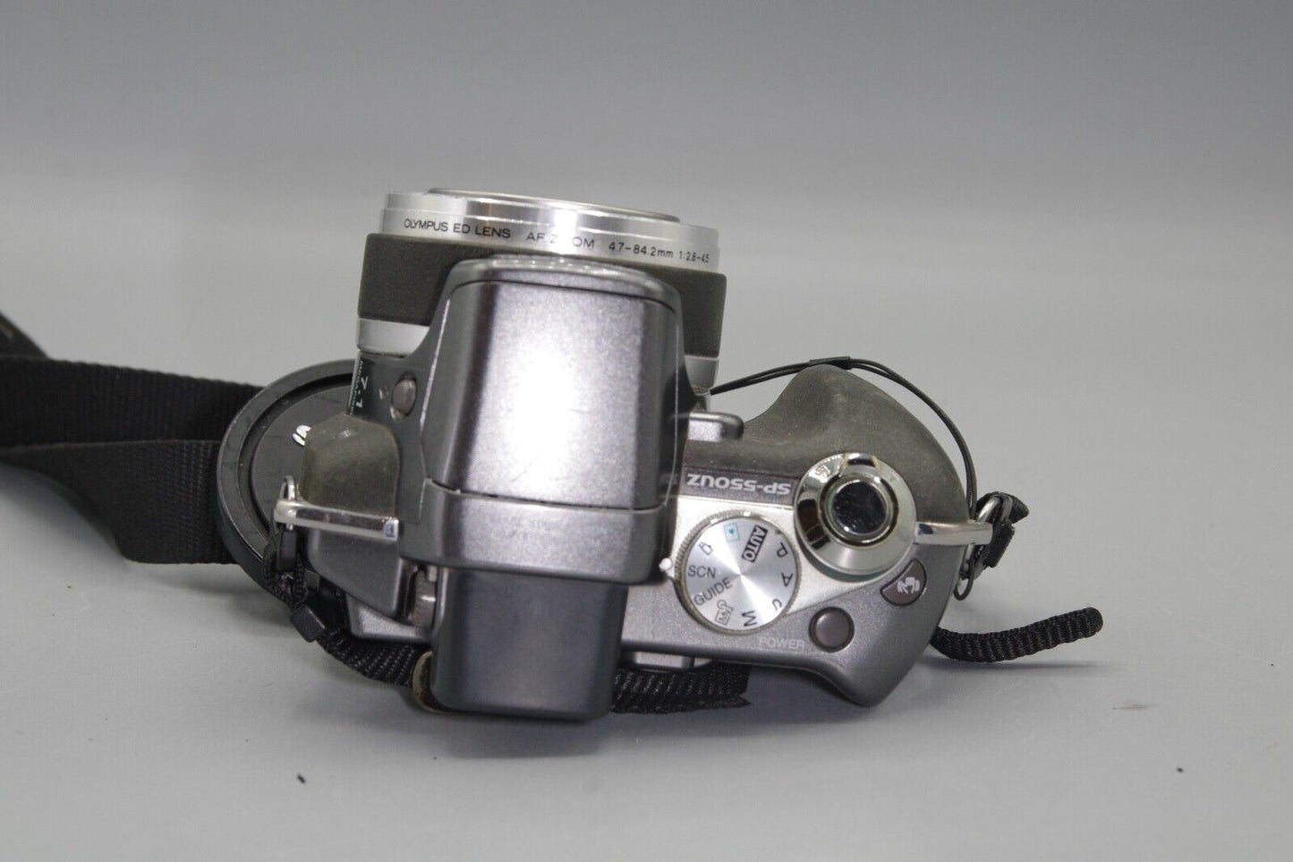 Olympus Stylus SP-550UZ 7MP 18X Digital Bridge Camera - Repair Required