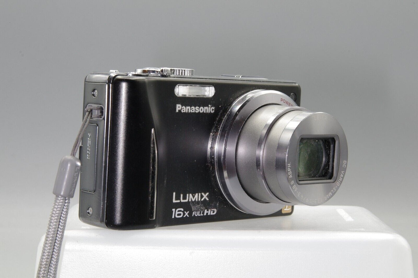 Panasonic Lumix DMC-ZS10 14.1MP Digital Camera - Working but needs battery cover
