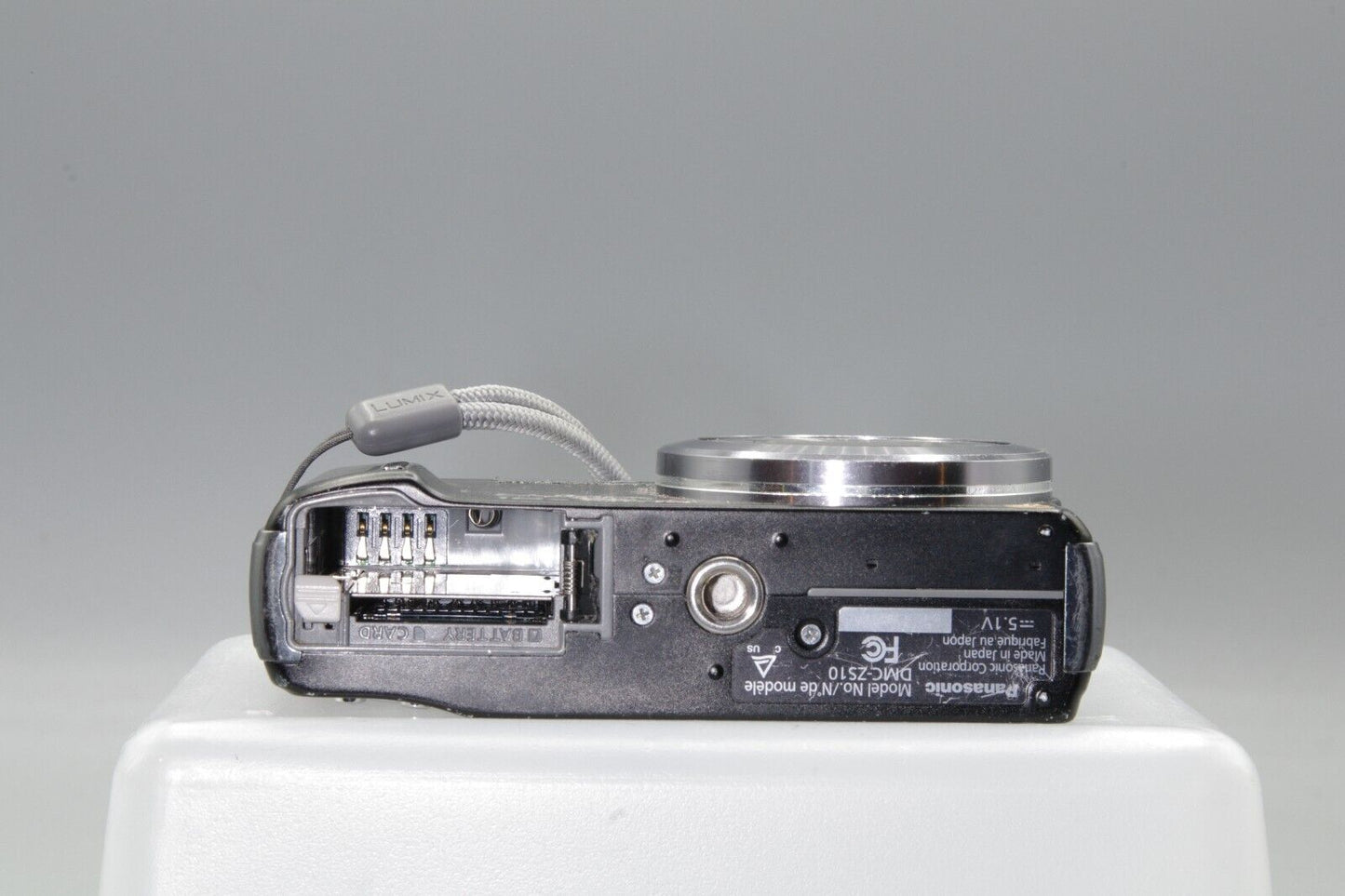 Panasonic Lumix DMC-ZS10 14.1MP Digital Camera - Working but needs battery cover