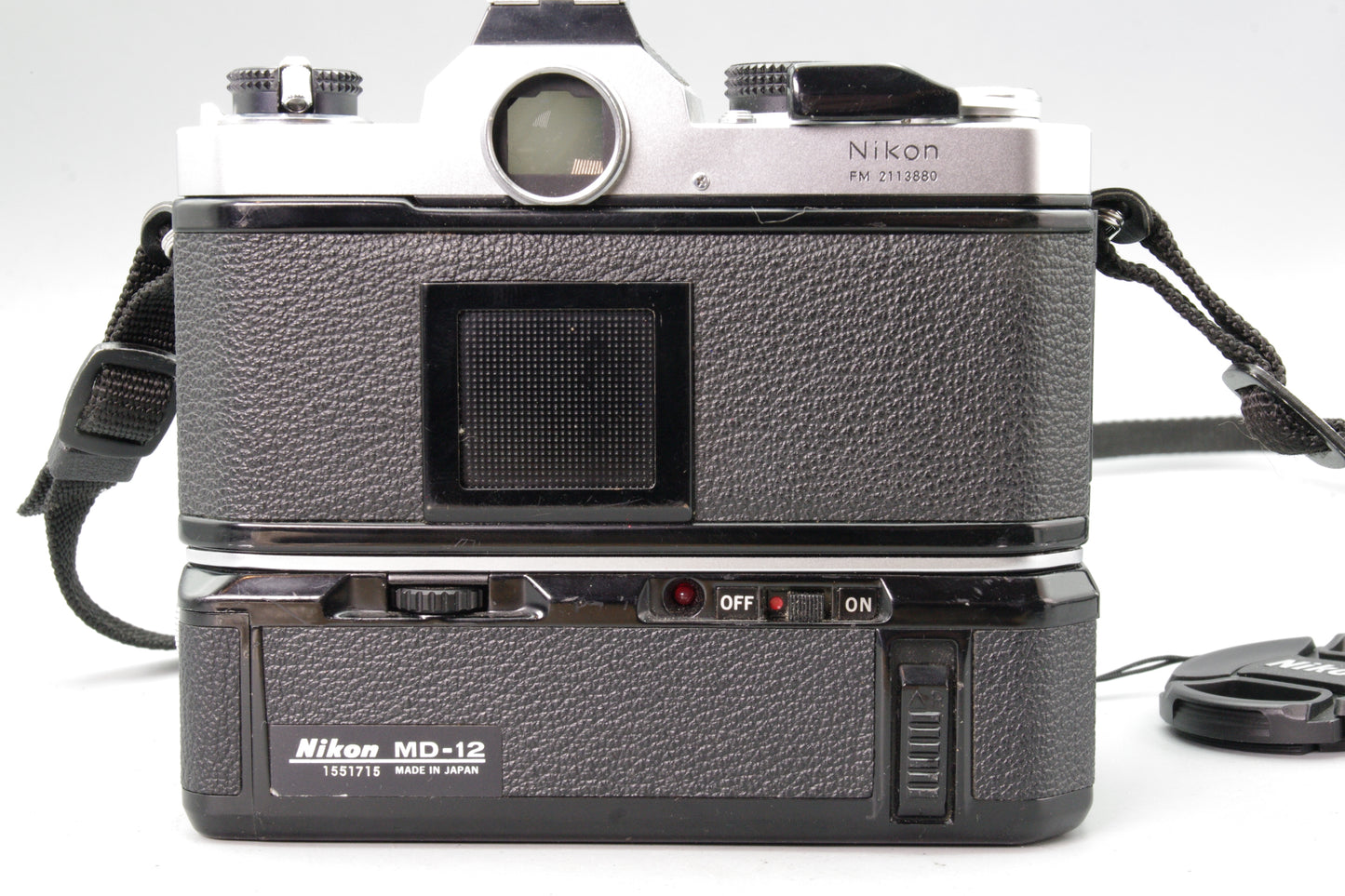 Nikon FM + MD‑12 Motor Drive + Bell & Howell 35‑70mm Lens – Tested – Very Good