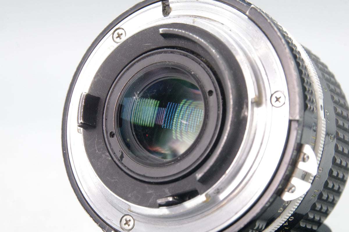 Nikon Nikkor 24mm f/2.8 AI Lens – Very Good – With Caps – Focus Loose