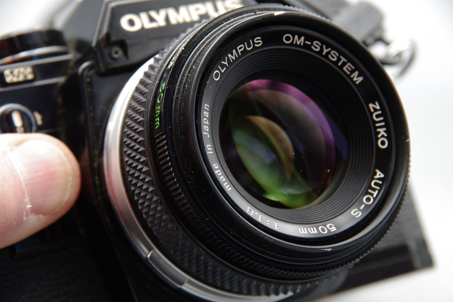 Black Olympus OM10 35mm SLR Camera + 50mm F/1.8 Lens + Batteries