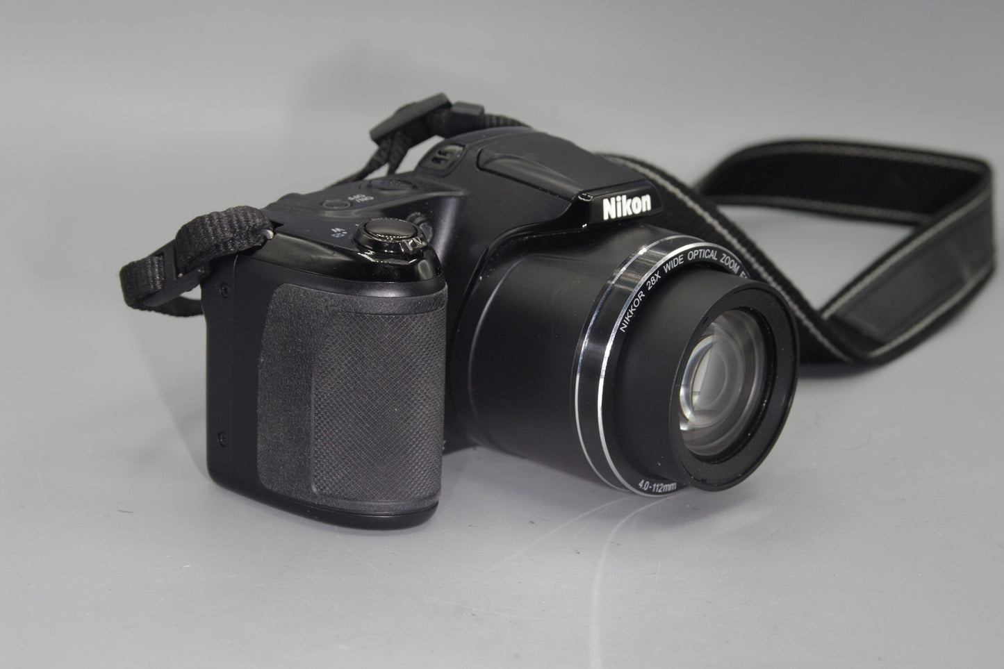 Nikon Coolpix L120 14.1MP Digital Bridge Camera – 21x Zoom, HD Video, Takes AA Batteries