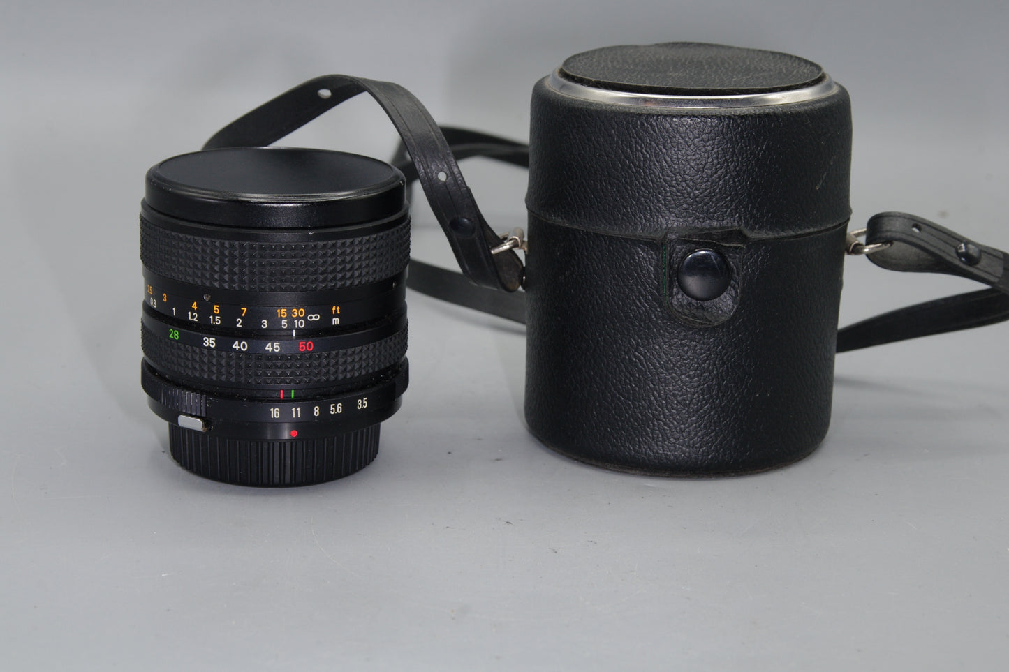 Super Paragon PMC 28–50mm f/3.5–4.5 Zoom Lens – OM Mount, Manual Focus