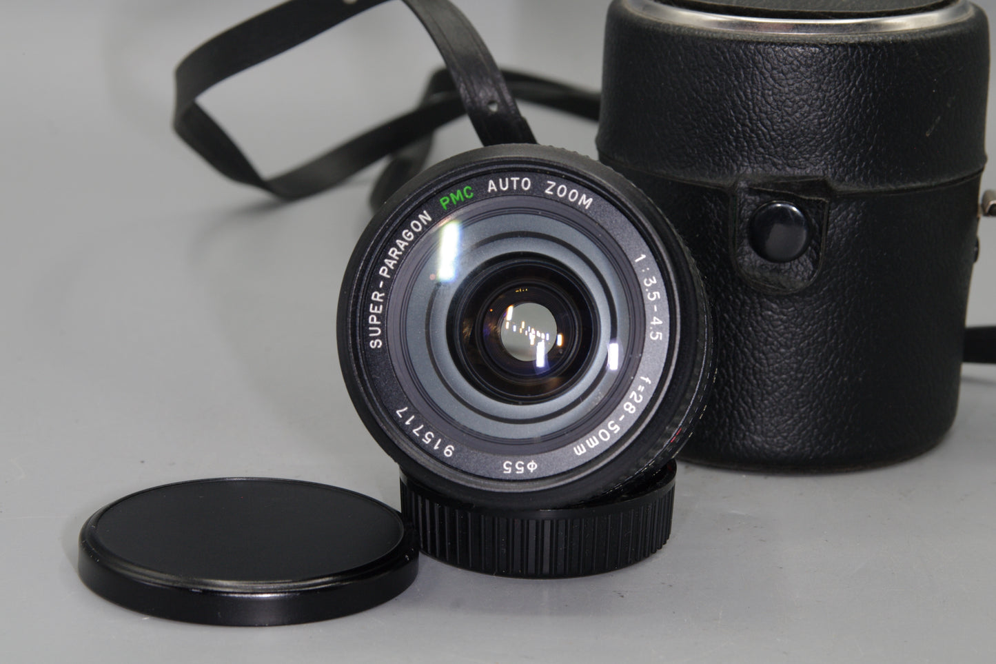 Super Paragon PMC 28–50mm f/3.5–4.5 Zoom Lens – OM Mount, Manual Focus