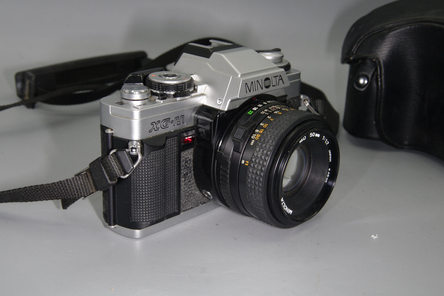 Minolta XG-M 35mm SLR Film Camera + Rokkor 50mm f/1.7 Lens, Case & Batteries