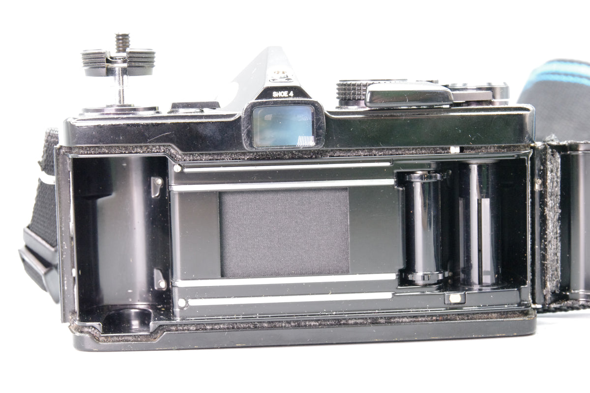 Olympus OM‑1N Black 35mm SLR Film Camera with Zuiko 50mm f/1.8 Lens – VGC
