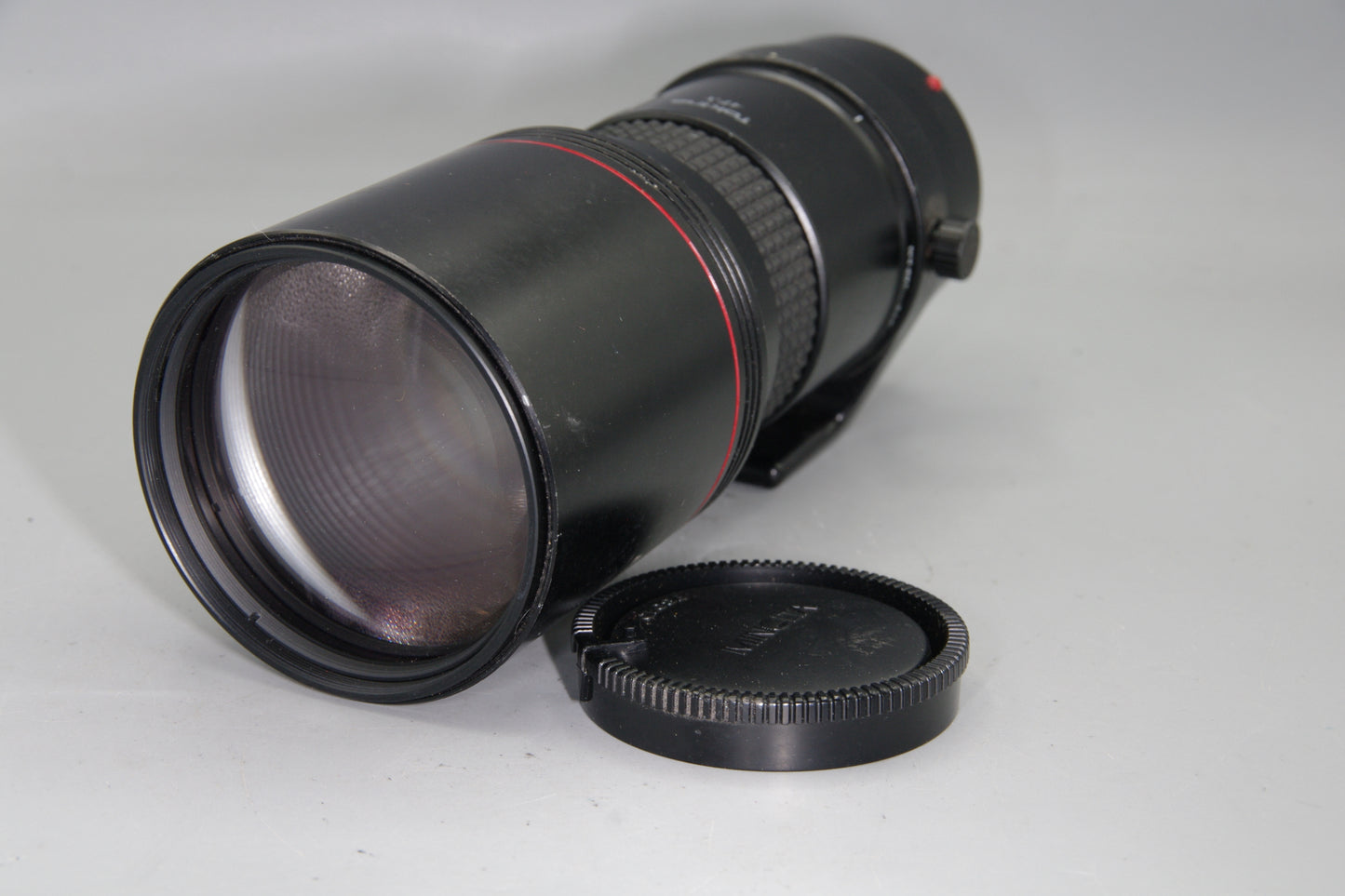 Tokina AT-X 400mm f/5.6 SD AF – Minolta/Sony A Mount – Haze – Caps