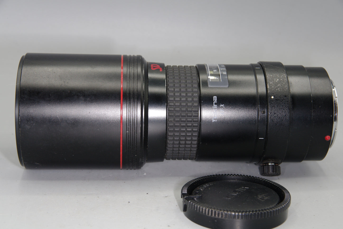 Tokina AT-X 400mm f/5.6 SD AF – Minolta/Sony A Mount – Haze – Caps
