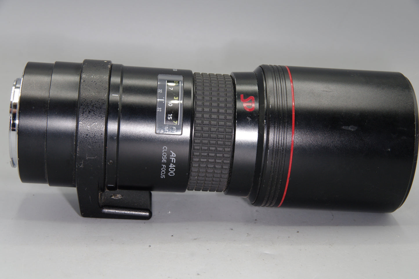 Tokina AT-X 400mm f/5.6 SD AF – Minolta/Sony A Mount – Haze – Caps