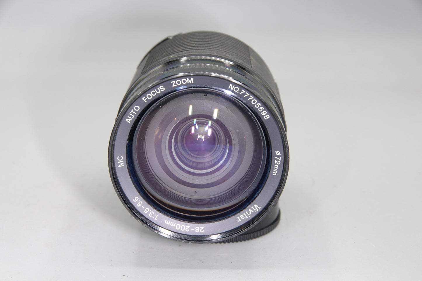 Vivitar 28–200mm f/3.5–5.6 Zoom – Sony/Minolta A Mount – Minor Haze – Caps
