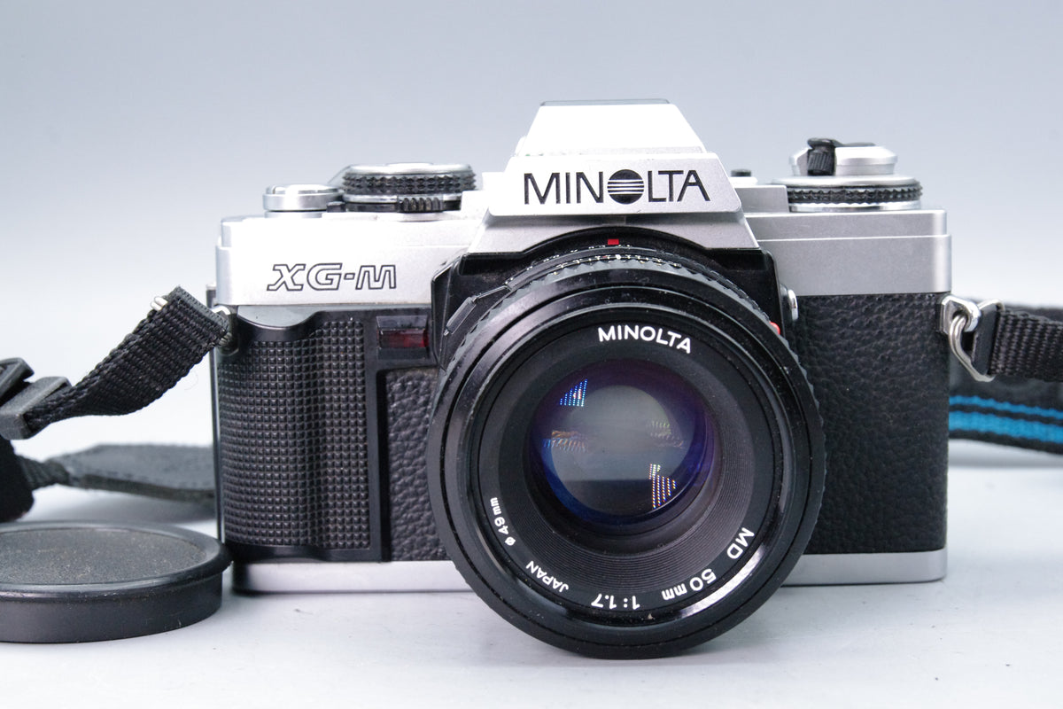 Minolta XG‑M 35mm SLR + MD 50mm f/1.7 Lens – Excellent