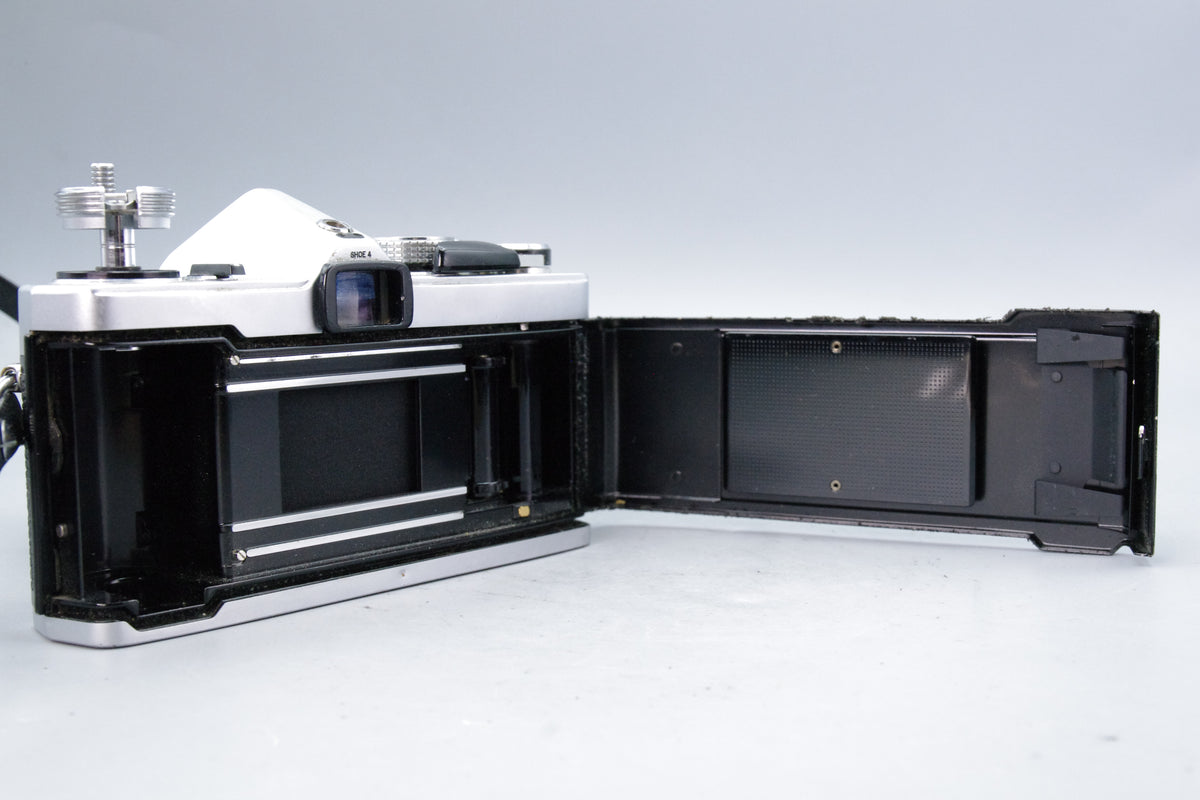 Olympus OM‑1N 35mm SLR Film Camera + Zuiko 50mm f/1.8 Lens – Very Good