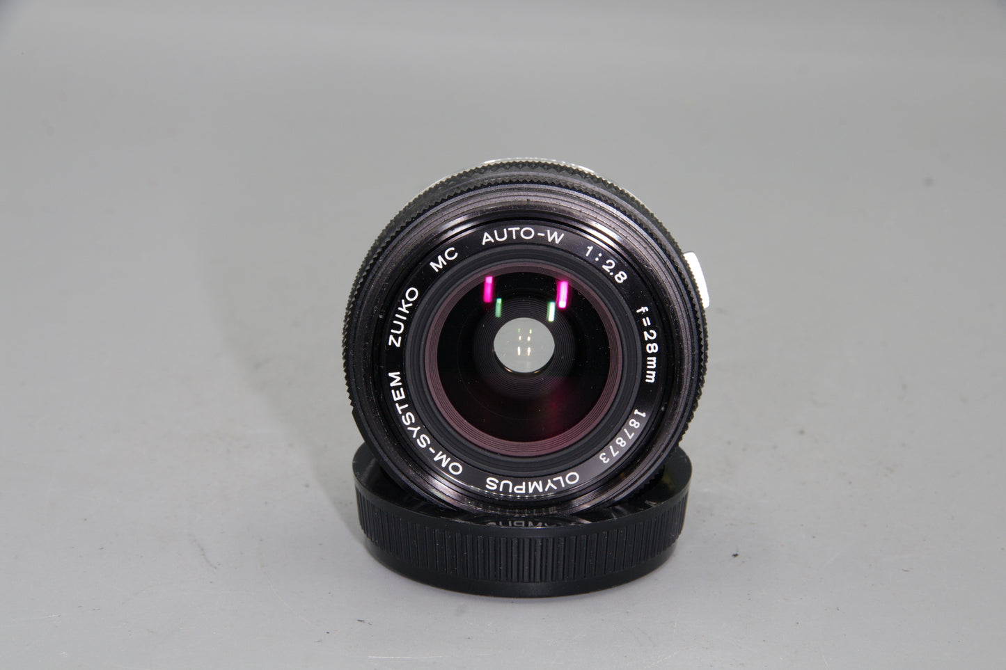 Olympus Zuiko Auto-W 28mm f/2.8 Wide Angle Lens – OM Mount – EXC Tested