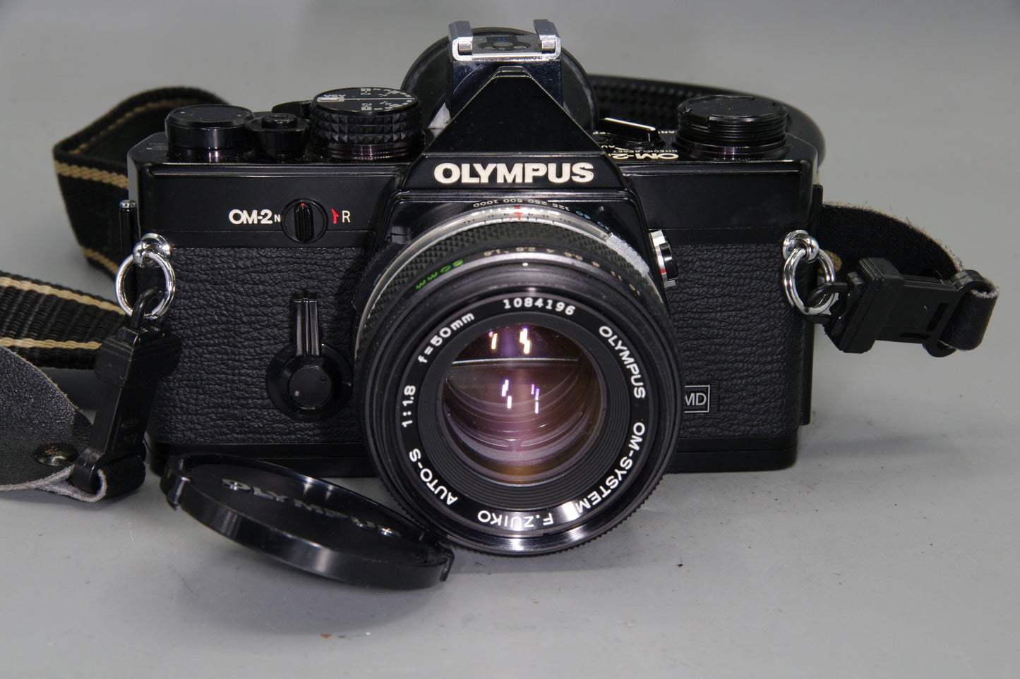 Olympus OM-2N Black 35mm SLR + Zuiko 50mm f/1.8 Lens – Tested & New Batteries