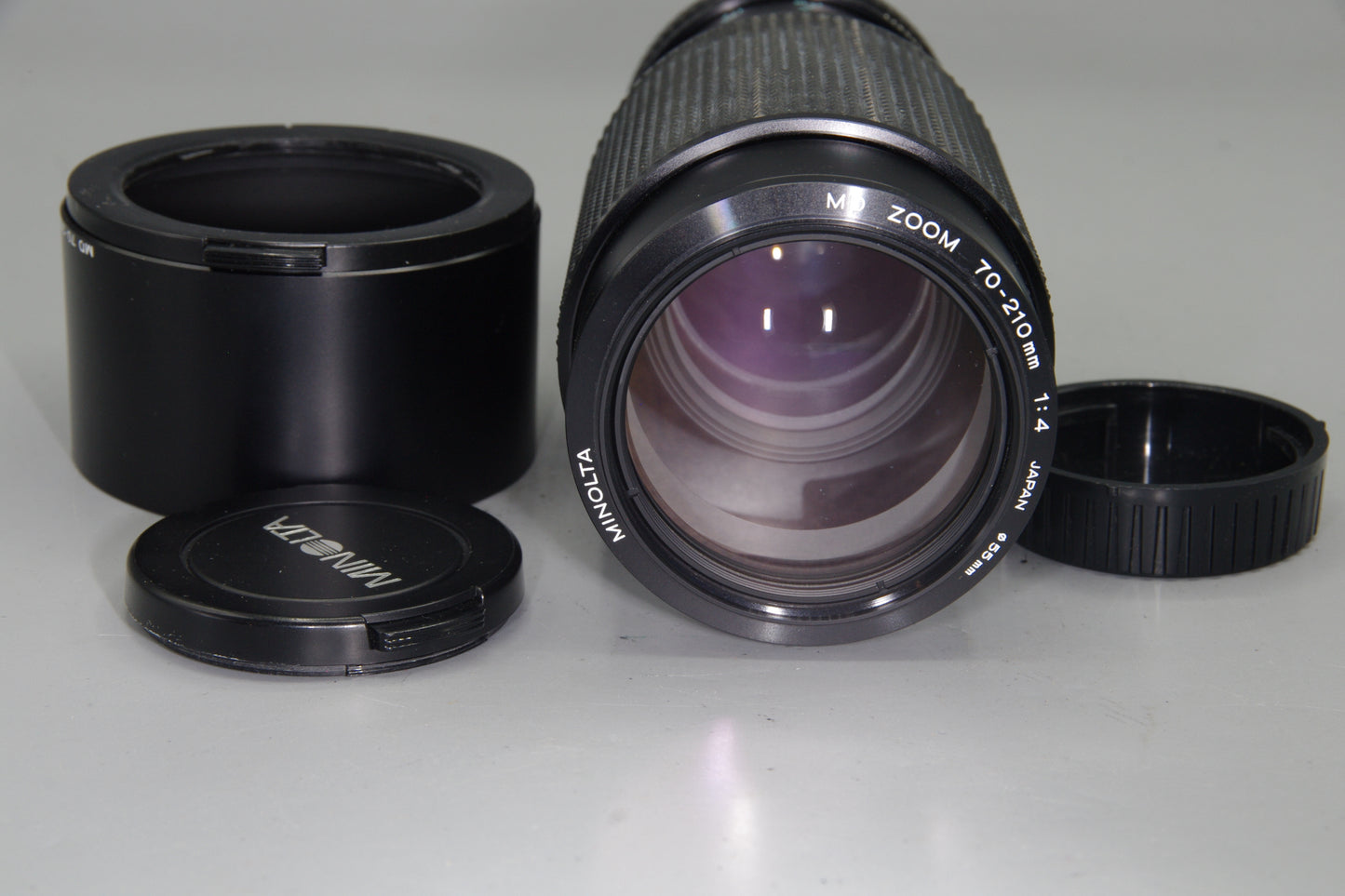 Minolta MD Zoom 70–210mm f/4 Lens – Very Good Condition with Hood