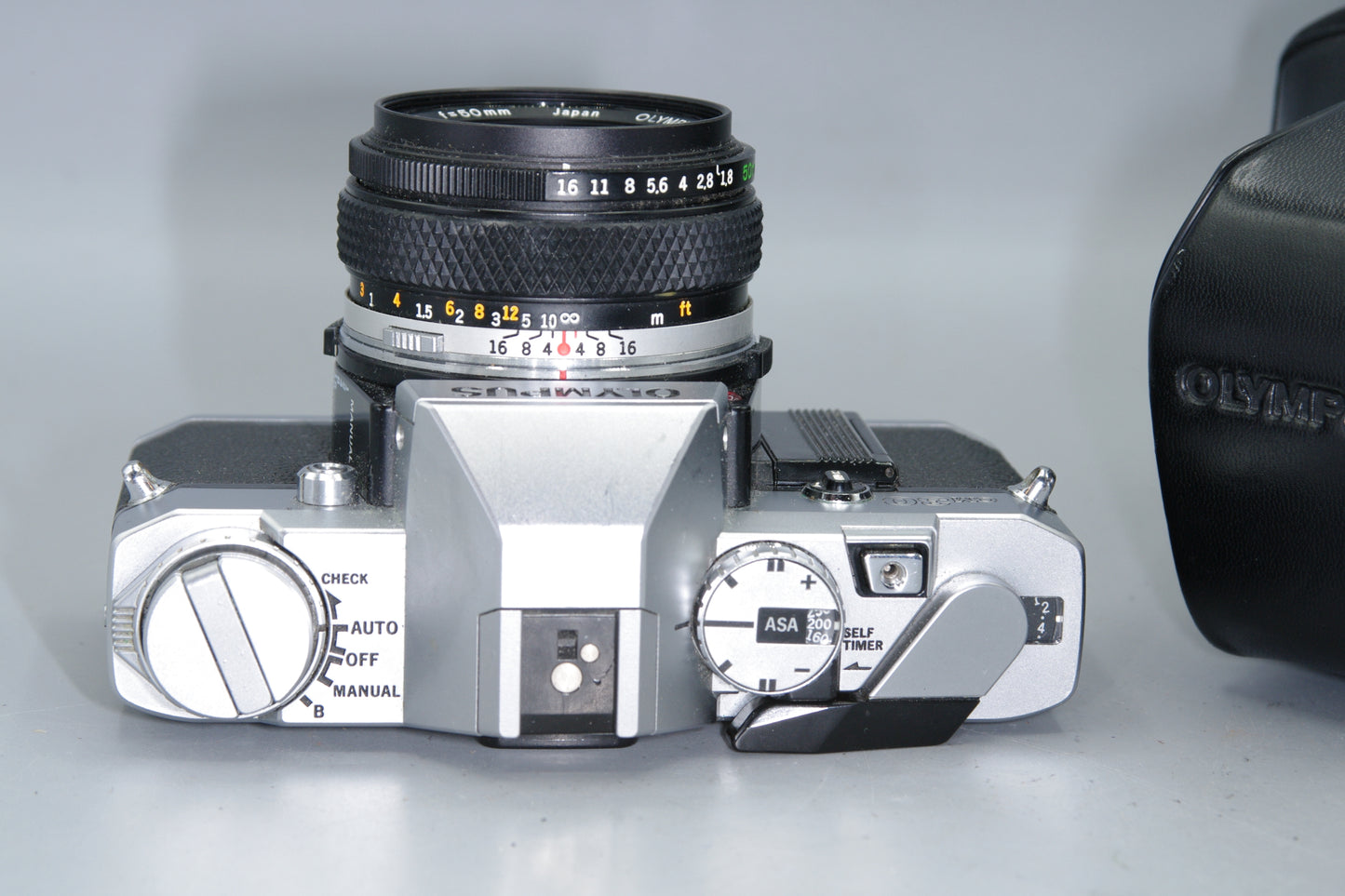 Olympus OM30 35mm SLR Camera with 50mm Lens and Case + New Batteries