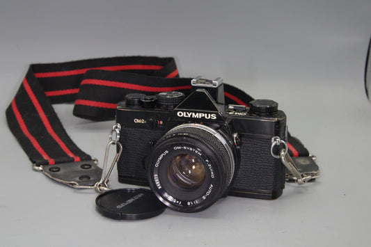 Olympus OM-2N Black 35mm SLR + Zuiko 50mm f/1.8 Lens – Tested & New Batteries