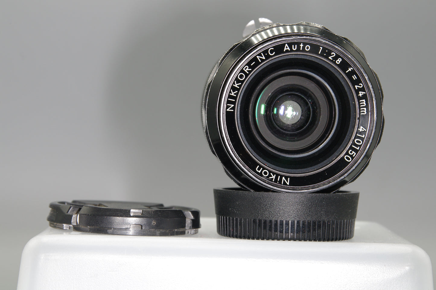 Nikon Nikkor-NC 24mm F/2.8 Pre-AI Lens with caps