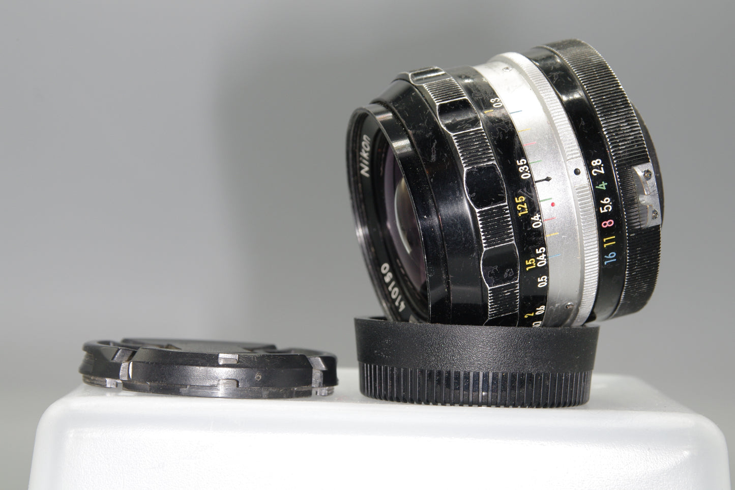 Nikon Nikkor-NC 24mm F/2.8 Pre-AI Lens with caps
