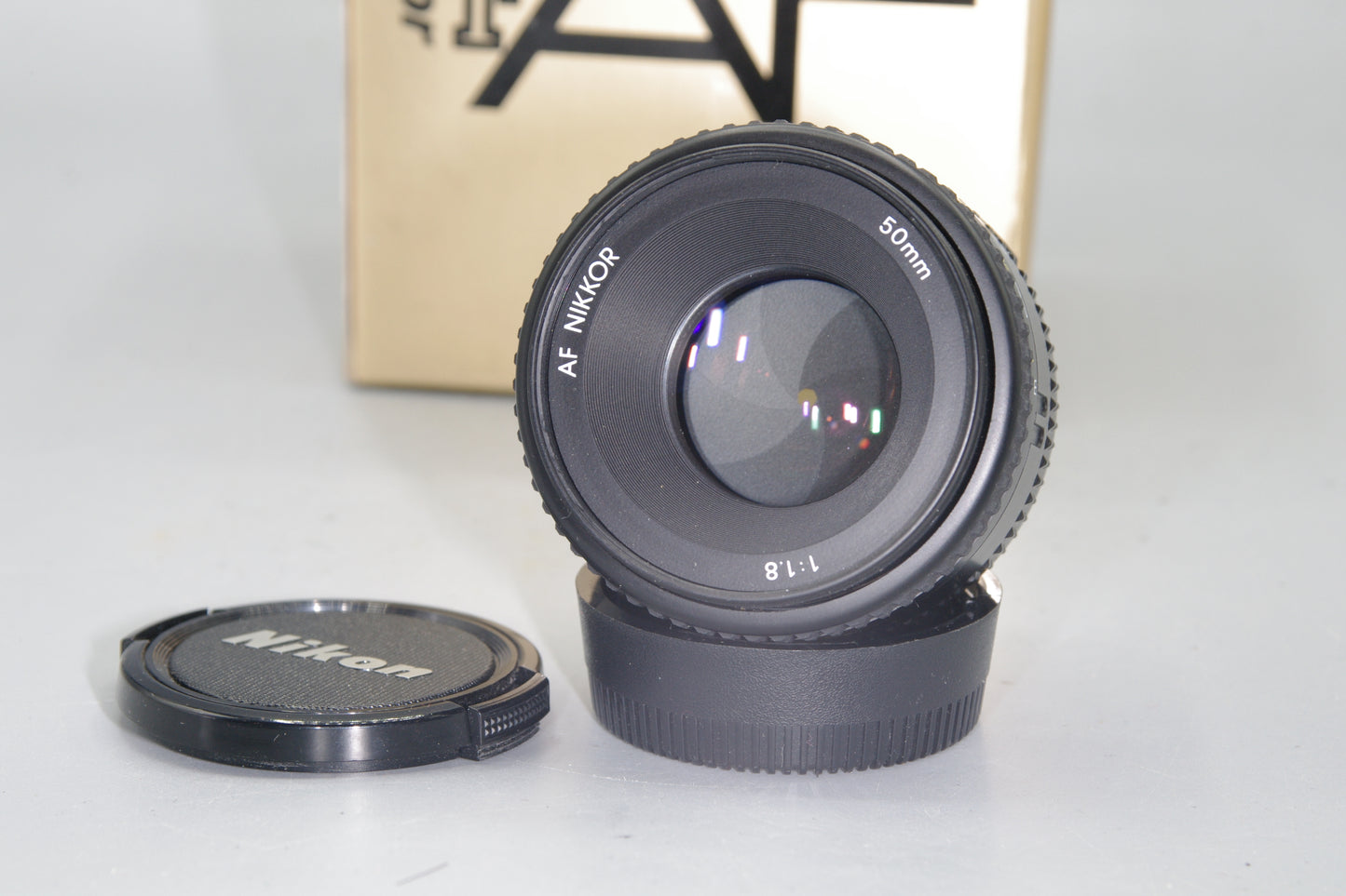 Nikon AF Nikkor 50mm F/1.8 Lens - with both caps and box - Excellent