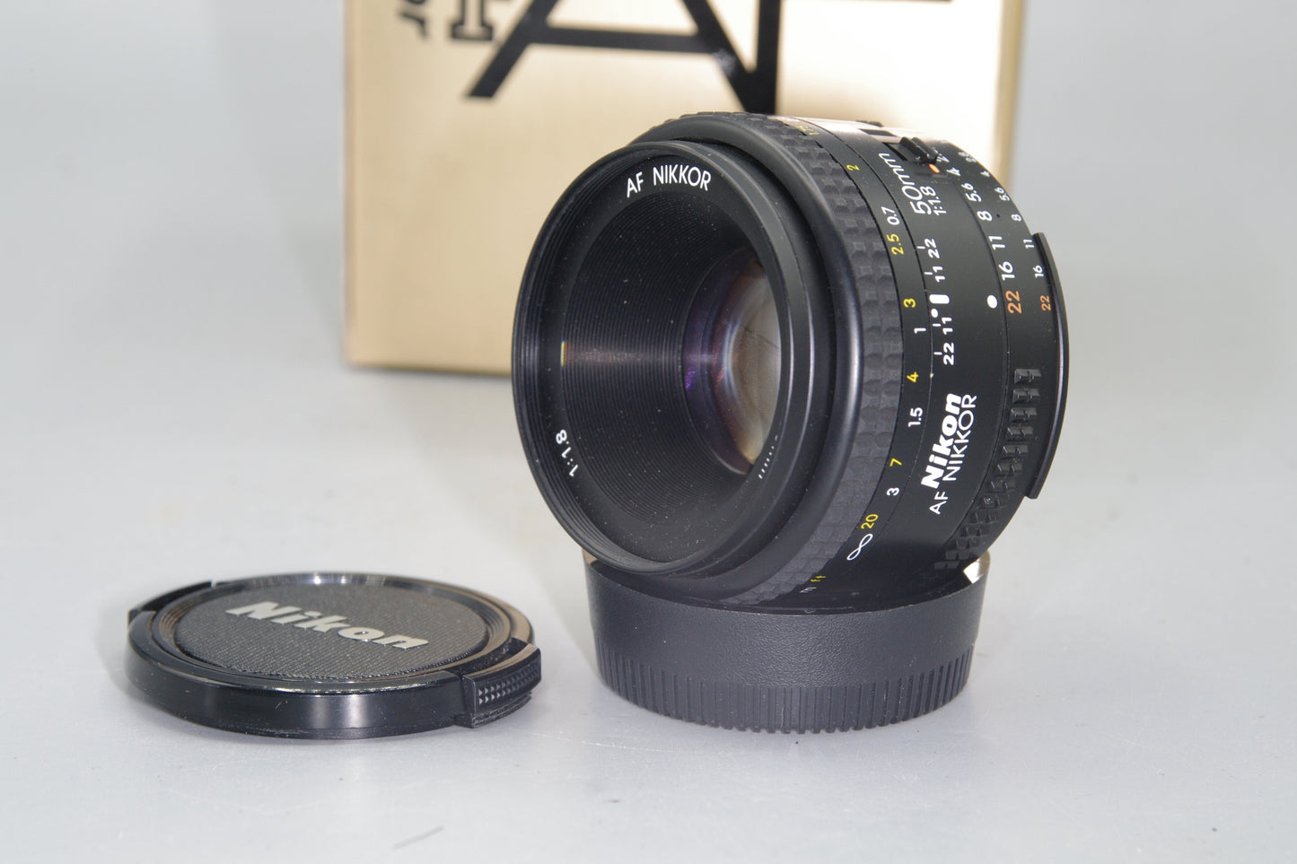 Nikon AF Nikkor 50mm F/1.8 Lens - with both caps and box - Excellent