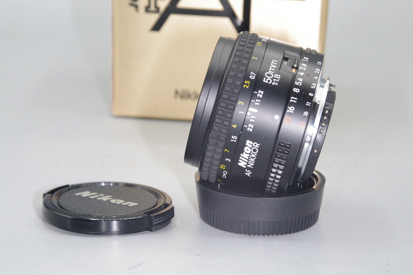 Nikon AF Nikkor 50mm F/1.8 Lens - with both caps and box - Excellent