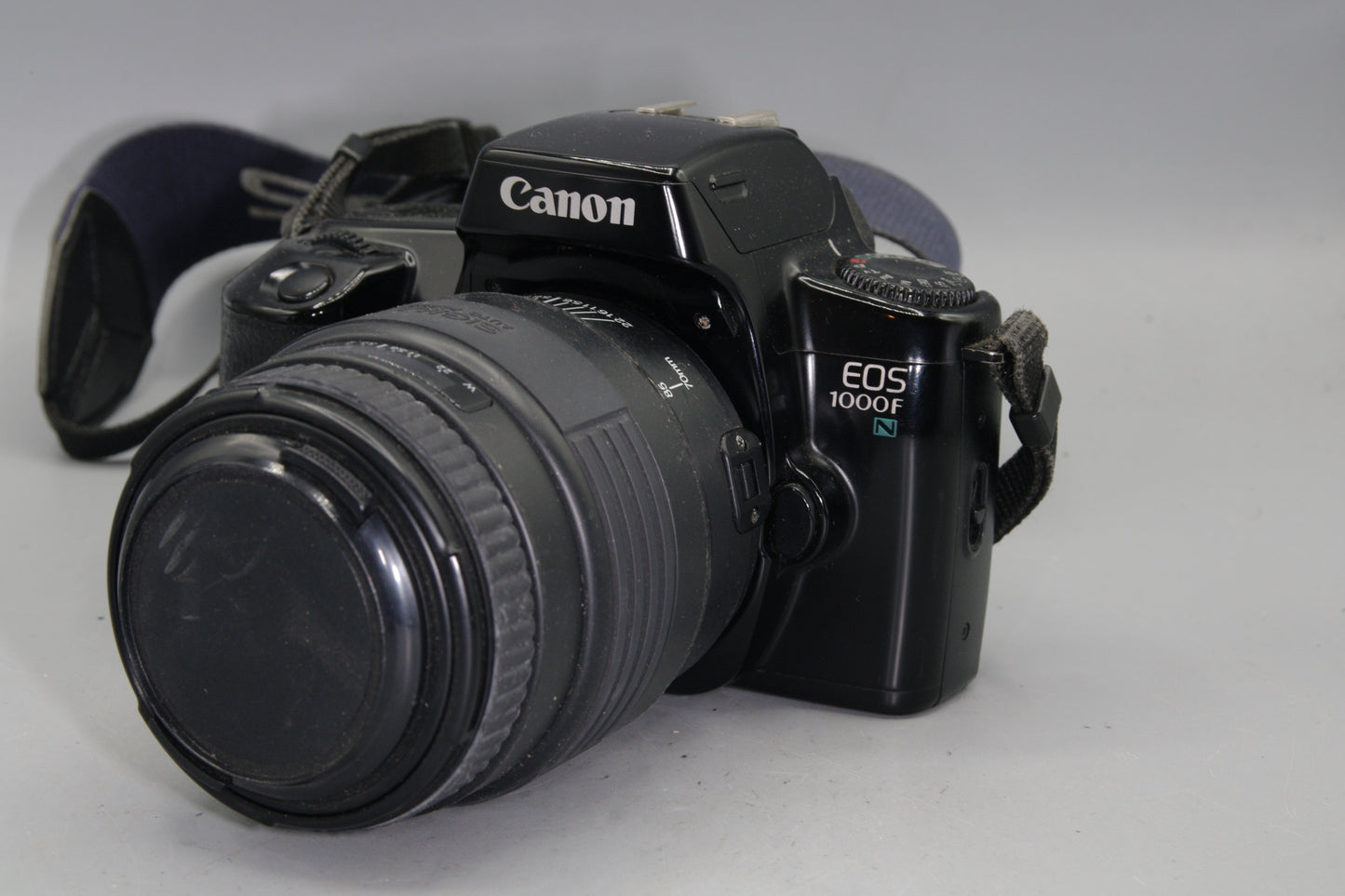 Canon EOS 1000FN 35mm SLR + Sigma 70–210mm Zoom Lens – Tested & Working