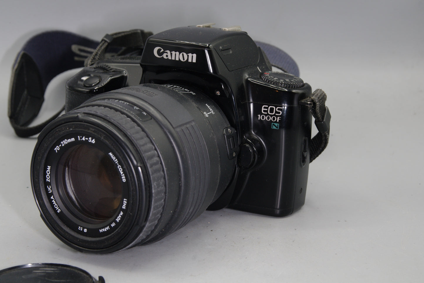 Canon EOS 1000FN 35mm SLR + Sigma 70–210mm Zoom Lens – Tested & Working