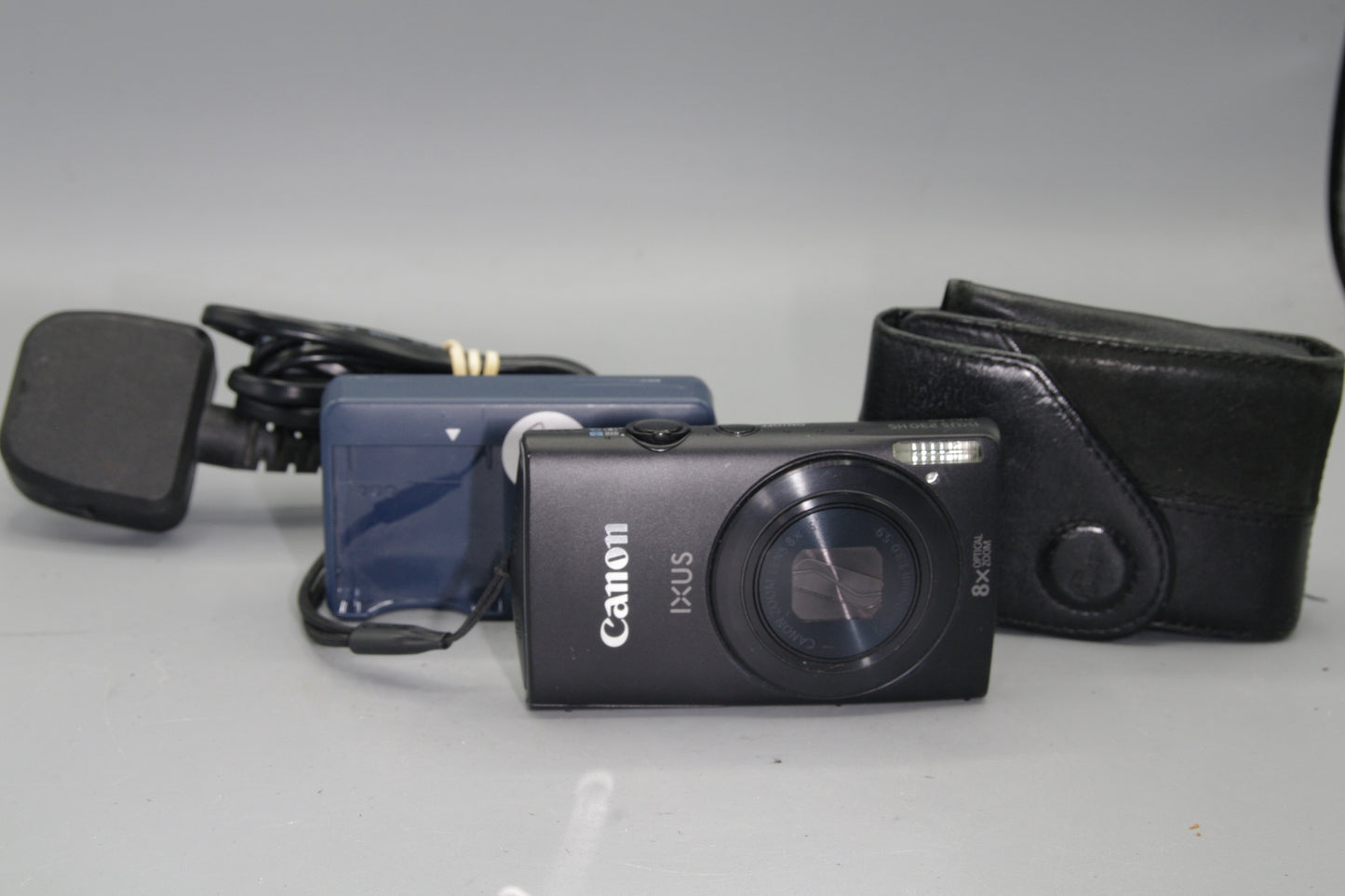 Canon IXUS 230HS 12.1MP Digital Camera with case and charger - Excellent
