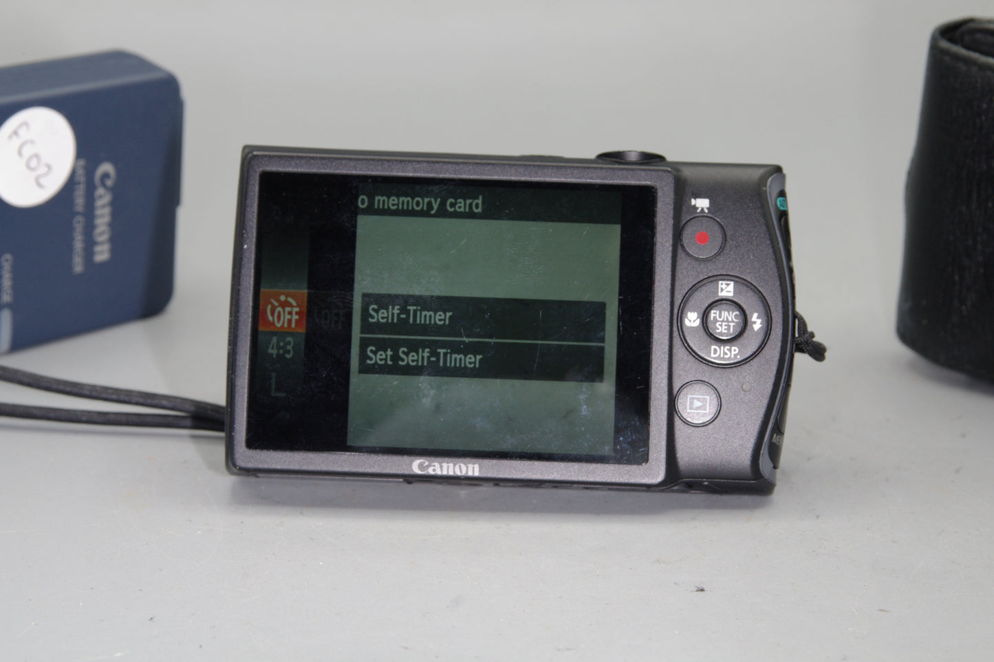 Canon IXUS 230HS 12.1MP Digital Camera with case and charger - Excellent