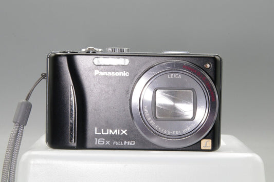 Panasonic Lumix DMC-ZS10 14.1MP Digital Camera - Working but needs battery cover