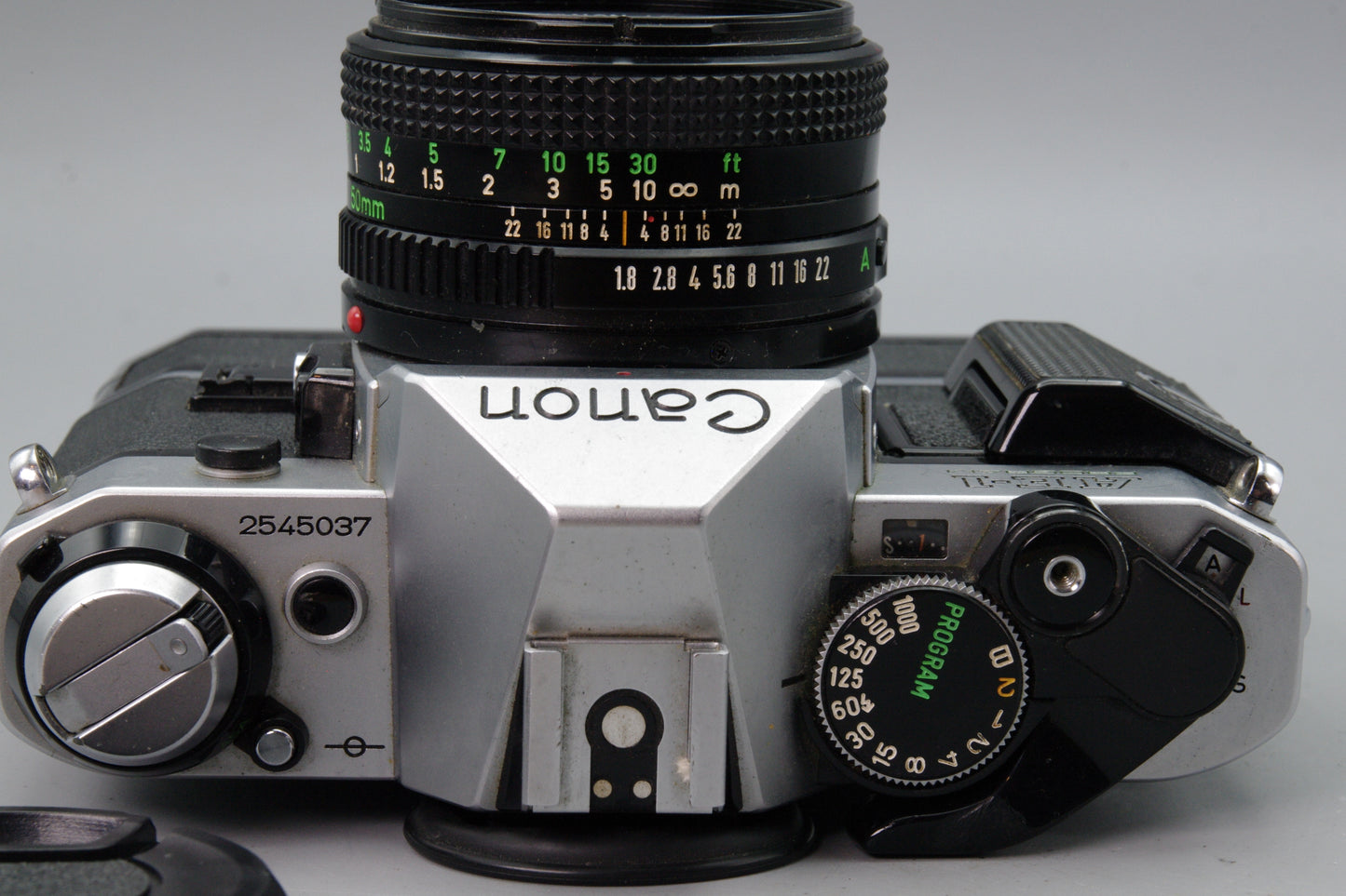 Canon AE‑1 Program + FD 50mm f/1.8 Lens with Winder – Tested & Working – VGC