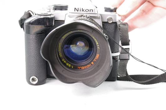 Nikon FM + MD‑12 Motor Drive + Bell & Howell 35‑70mm Lens – Tested – Very Good