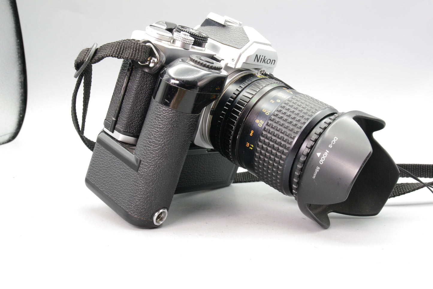 Nikon FM + MD‑12 Motor Drive + Bell & Howell 35‑70mm Lens – Tested – Very Good