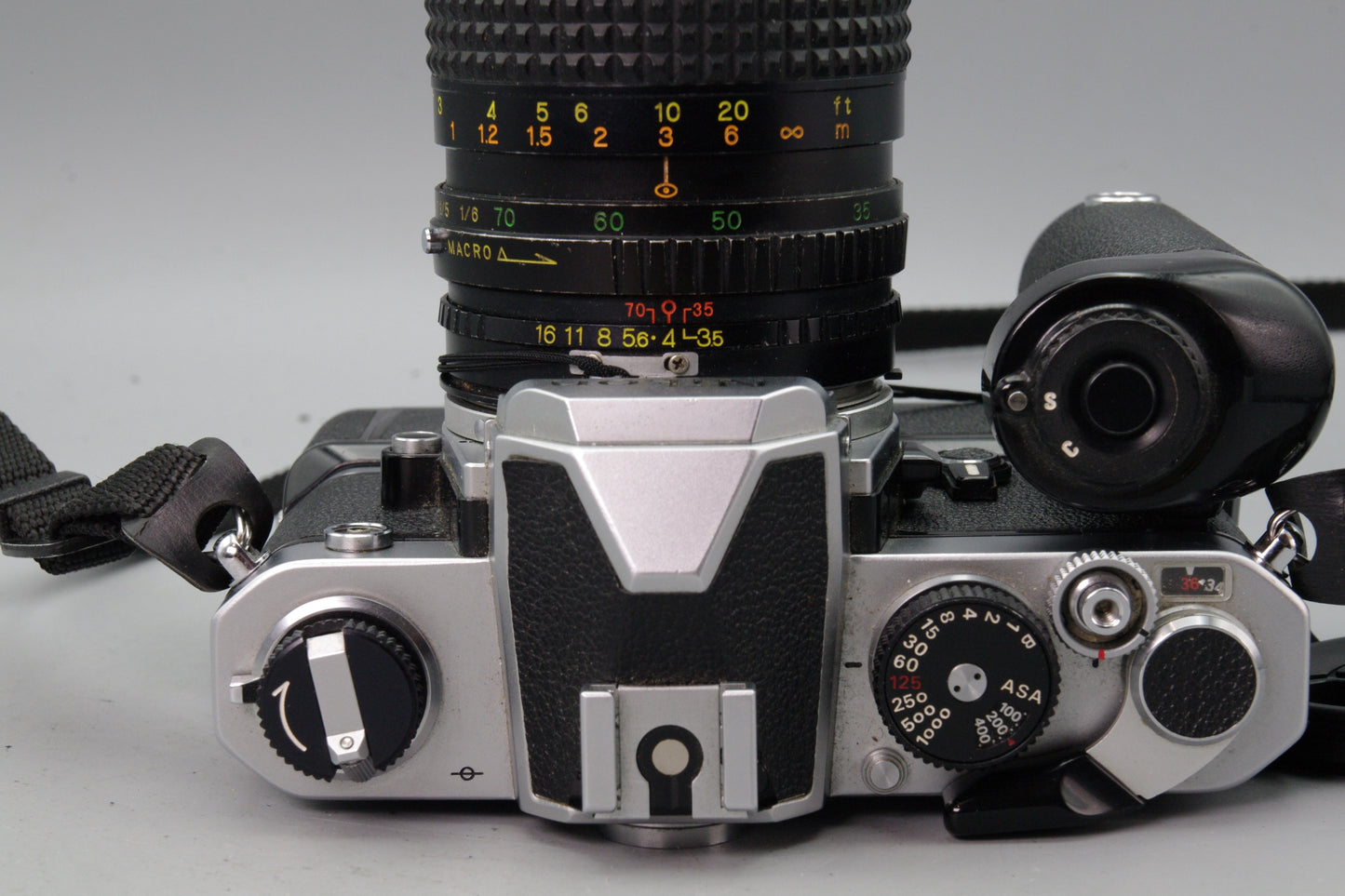 Nikon FM + MD‑12 Motor Drive + Bell & Howell 35‑70mm Lens – Tested – Very Good