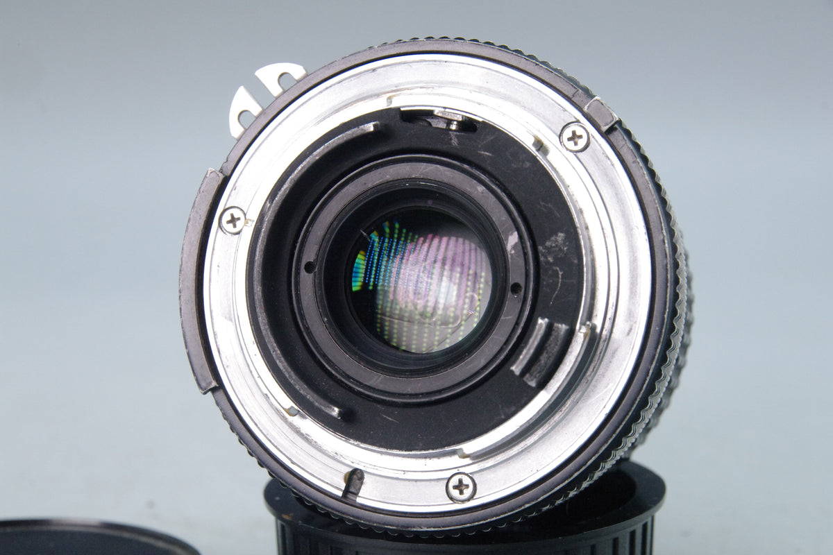Nikon Nikkor 24mm f/2.8 AI Lens – Very Good – With Caps – Focus  Loose