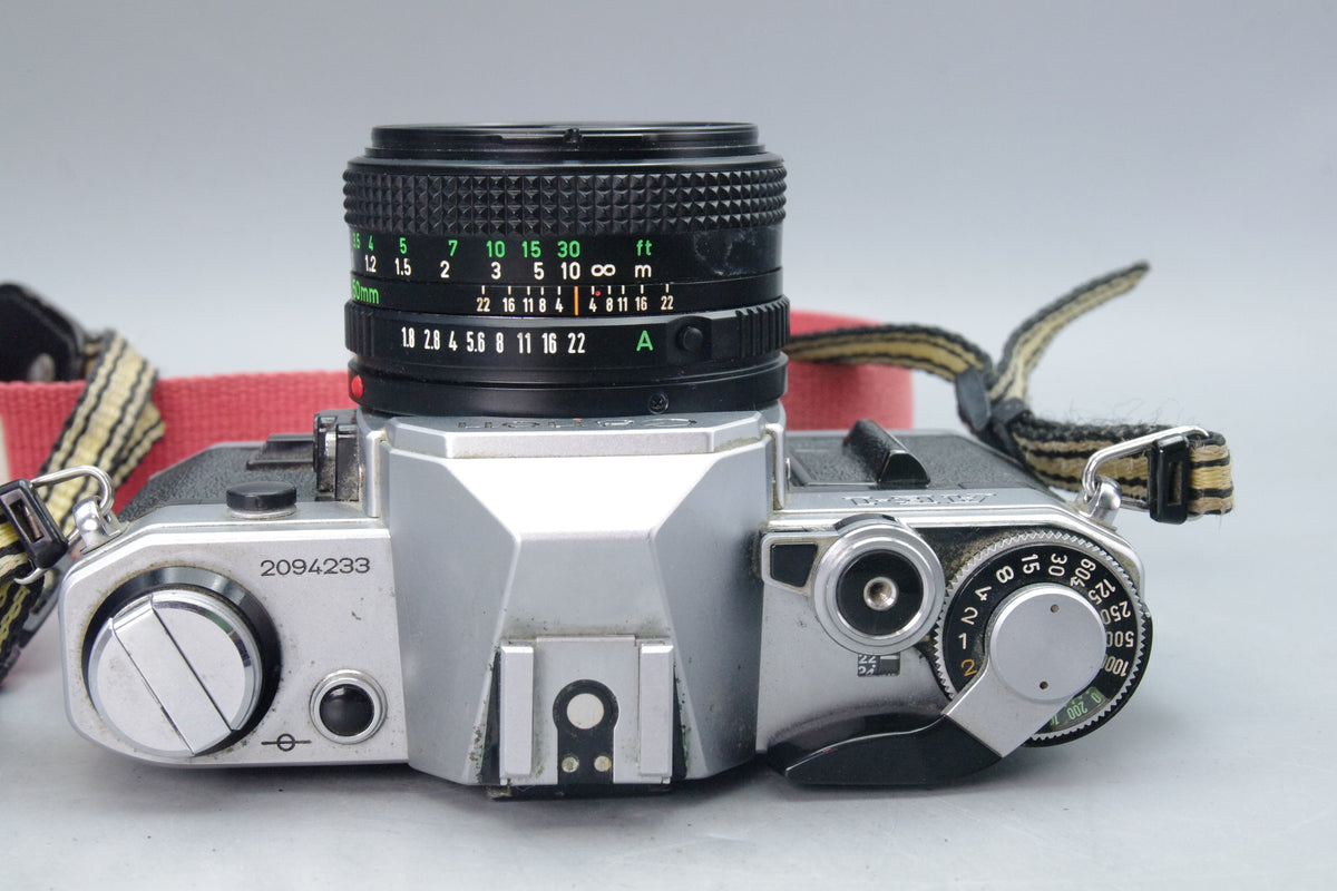 Canon AE-1 35mm SLR + 50mm f/1.8 Lens – Vintage Classic