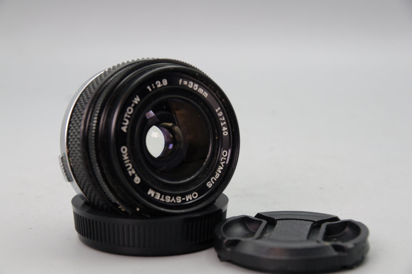 Olympus G.Zuiko Auto‑W 35mm f/2.8 Lens – OM Mount – With Both Caps