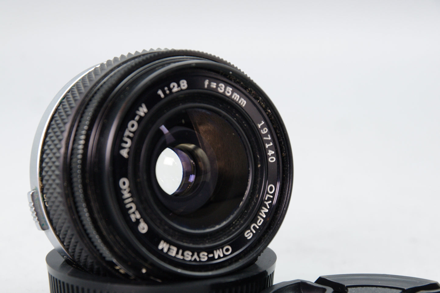 Olympus G.Zuiko Auto‑W 35mm f/2.8 Lens – OM Mount – With Both Caps