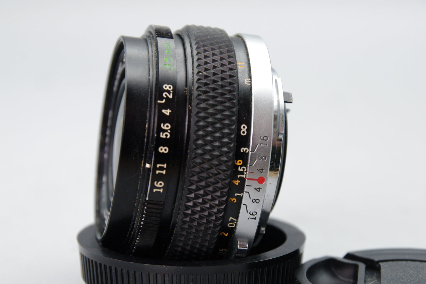 Olympus G.Zuiko Auto‑W 35mm f/2.8 Lens – OM Mount – With Both Caps