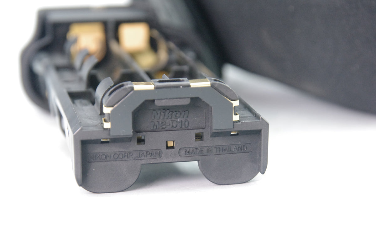 Nikon MS‑D10 Battery Holder – Mint – Appears Unused – For MB‑D10 Grip