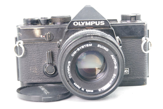 Olympus OM‑1 Black 35mm SLR + Zuiko 50mm f/1.8 – Classic Film Camera – VGC