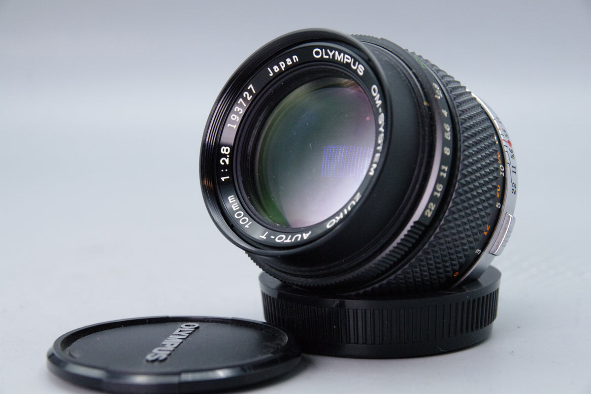 Olympus Zuiko Auto‑T 100mm f/2.8 Lens – OM Mount – With Both Caps & Case
