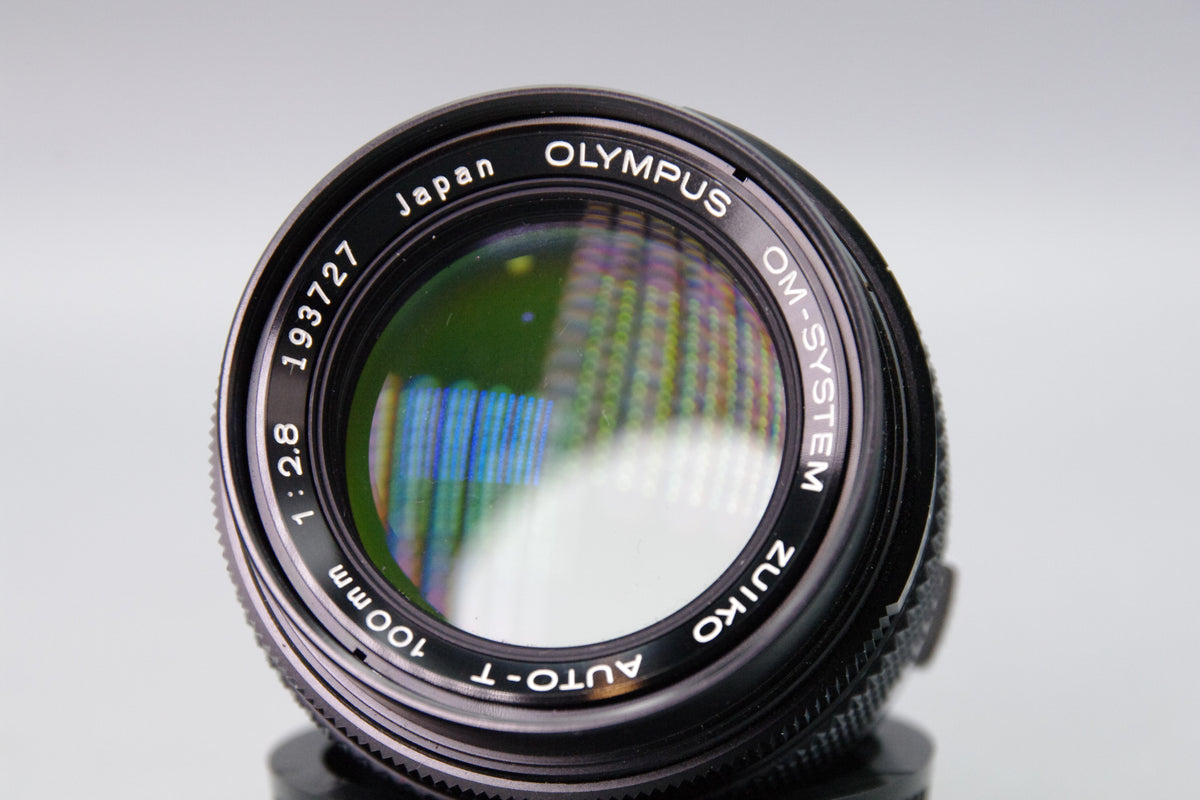 Olympus Zuiko Auto‑T 100mm f/2.8 Lens – OM Mount – With Both Caps & Case